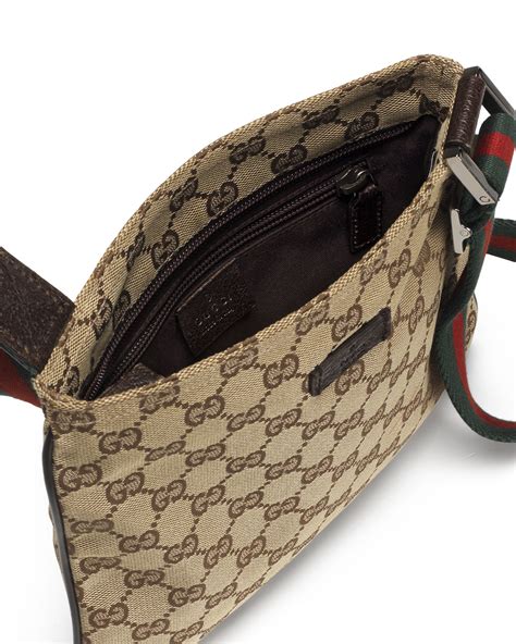 gucci bag with cloth strap.